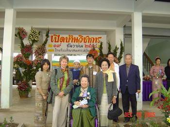 Seated is Khunying Bupphan Nimmanhaemindha and on her right Christine Olivares. Immediately behind Khunying stands Ajarn Kamol, the Deputy Director of the school. Look at the colorful tribal costumes of the parents who have come down to join the celebrations.